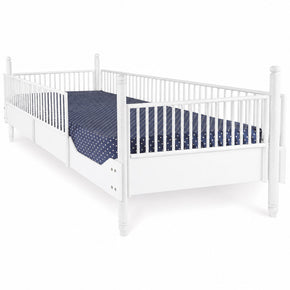 cama cuna de madera con barandales